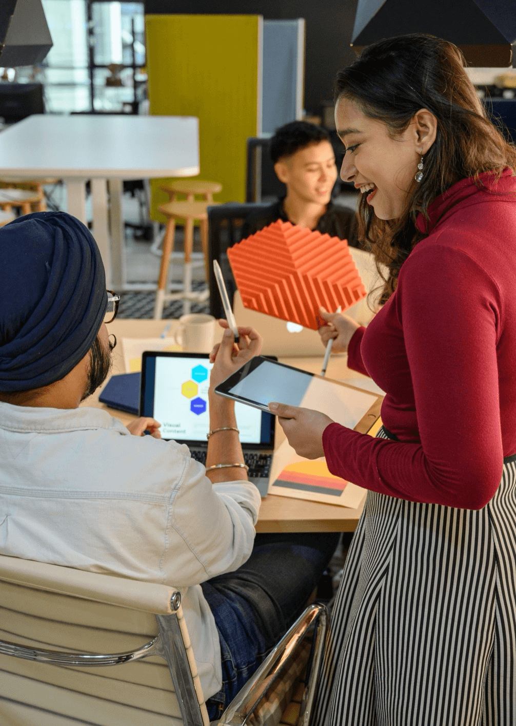 Team reviewing connected product data on screen